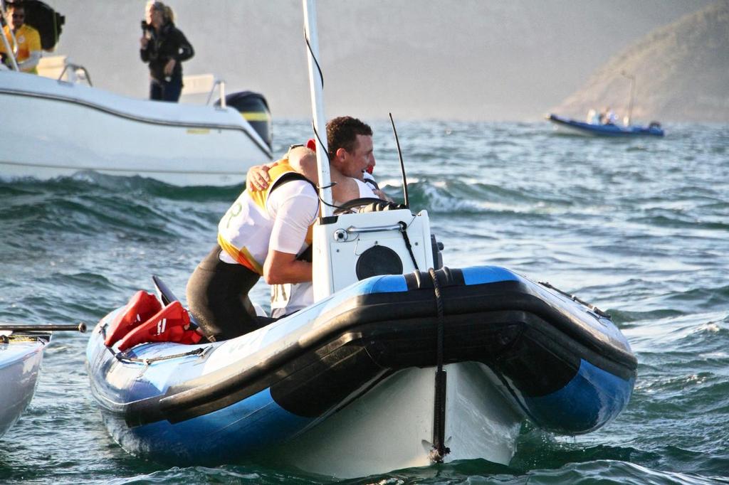 Day 7 - Finn August 14, 2016. Giles Scott celebrates his Gold Medal win in the Finn class with his coach. © Richard Gladwell www.photosport.co.nz